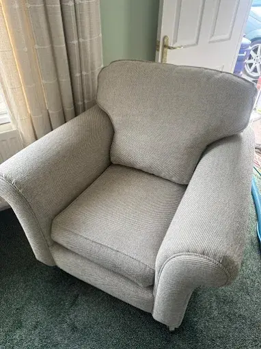 Clean grey fabric armchair from our upholstery work