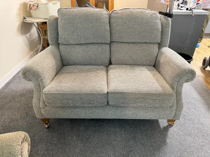 Clean grey two-seat sofa