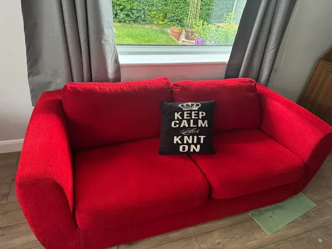 Clean bright red fabric sofa