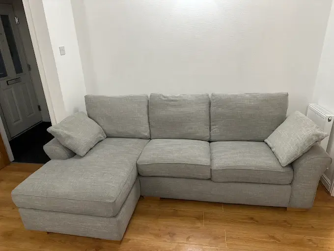 Clean grey corner sofa from our upholstery work
