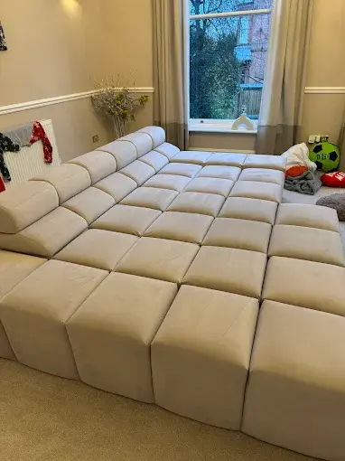 Large cream upholstered modular sofa