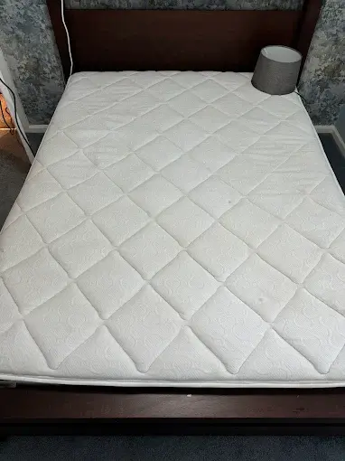 Clean white mattress with a quilted finish